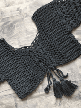 Top de bikini de crochet de manga corta con lazo frontal